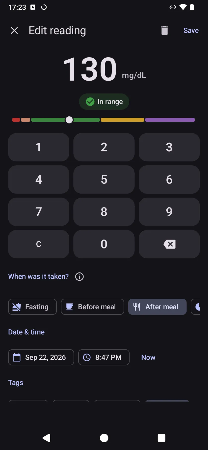 The reading entry screen, with a keypad, an in-range chip over a colour scale, and choices for when the reading was taken