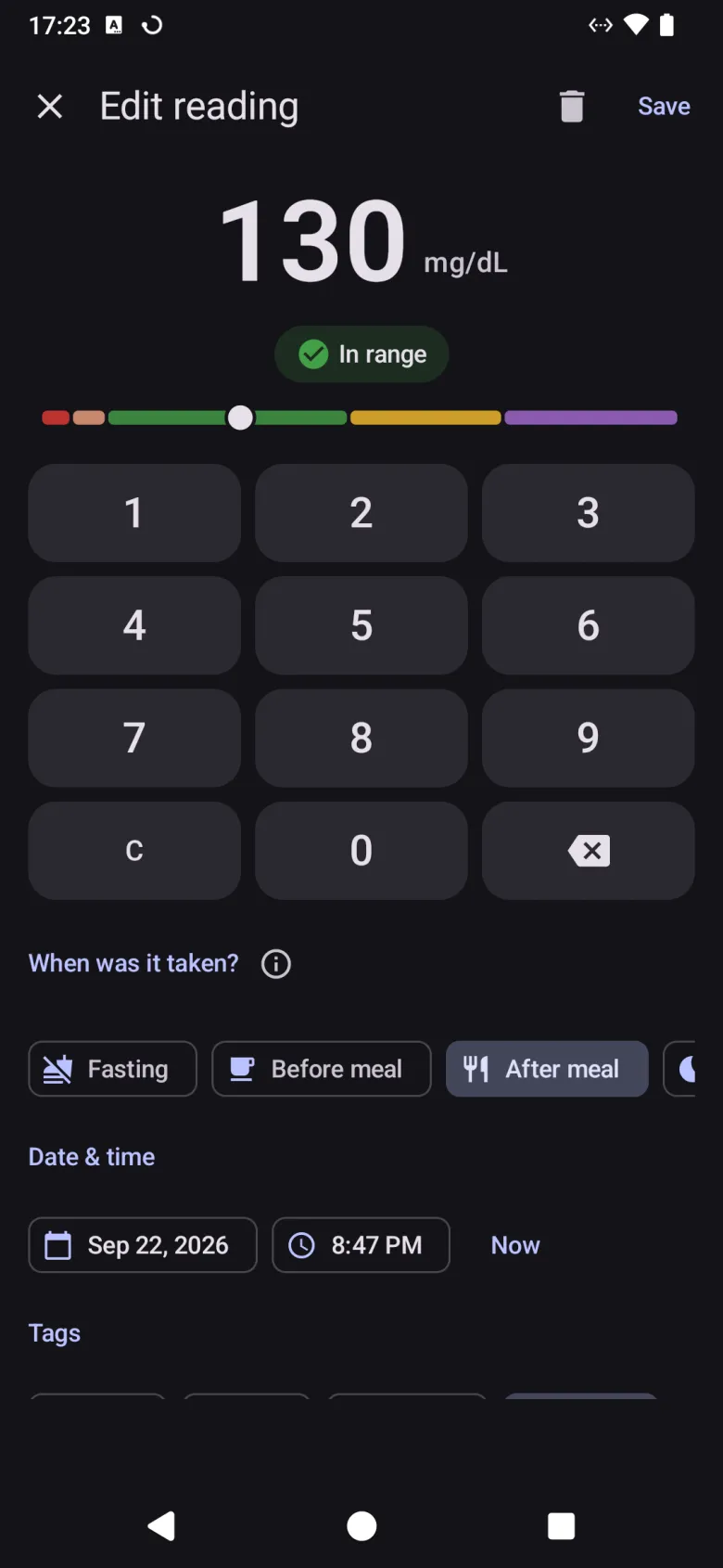 The reading entry screen, with a keypad, an in-range chip over a colour scale, and choices for when the reading was taken