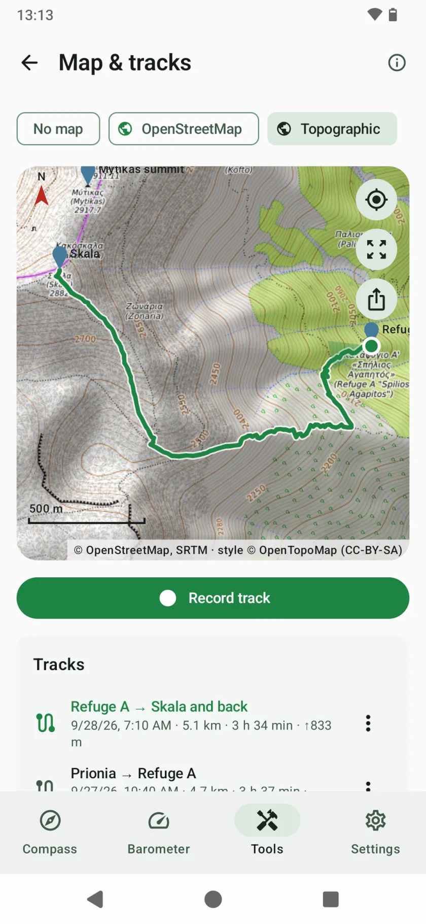Map & tracks: recorded tracks and waypoints on a topographic map, with a scale bar, a Record track button and the list of tracks
