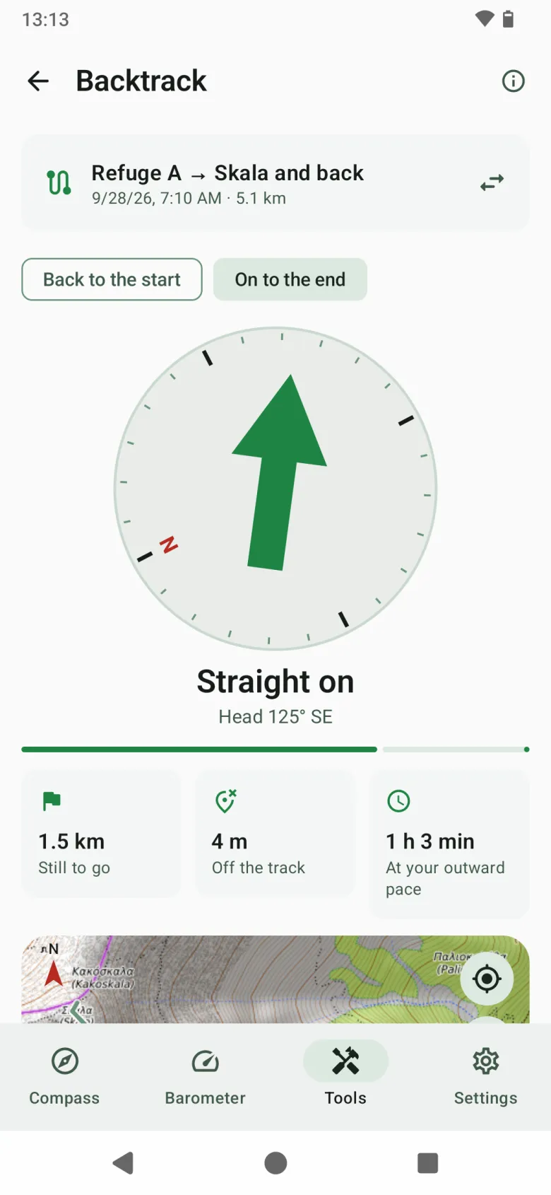 Backtrack: a large arrow pointing along a recorded track, with the distance still to go, how far off the track, and time left at the outward pace