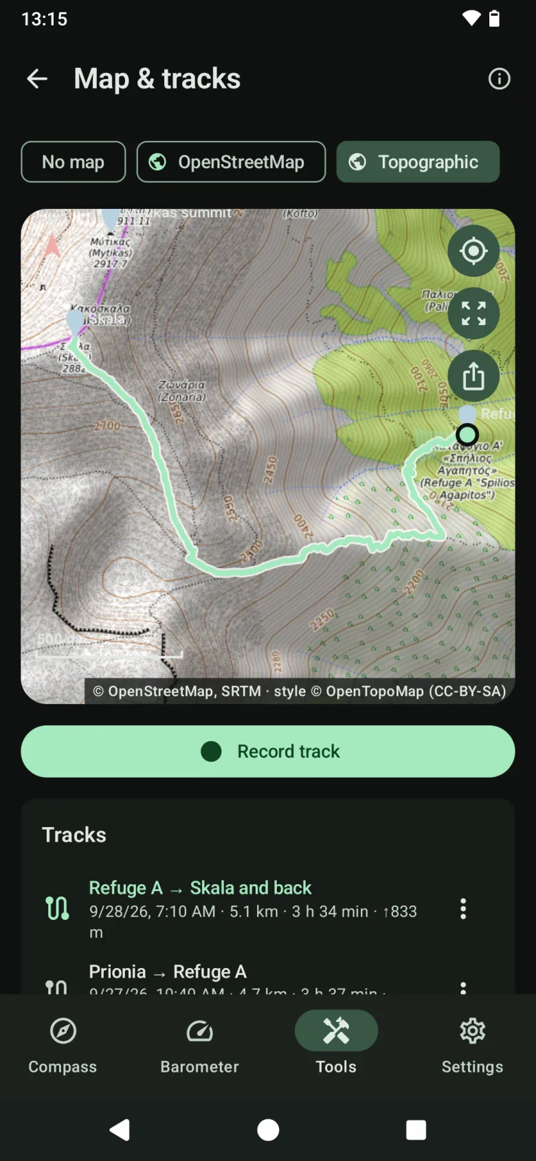 Map & tracks: recorded tracks and waypoints on a topographic map, with a scale bar, a Record track button and the list of tracks
